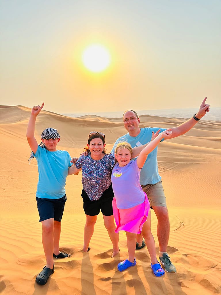 family enjoying in Dubai desert